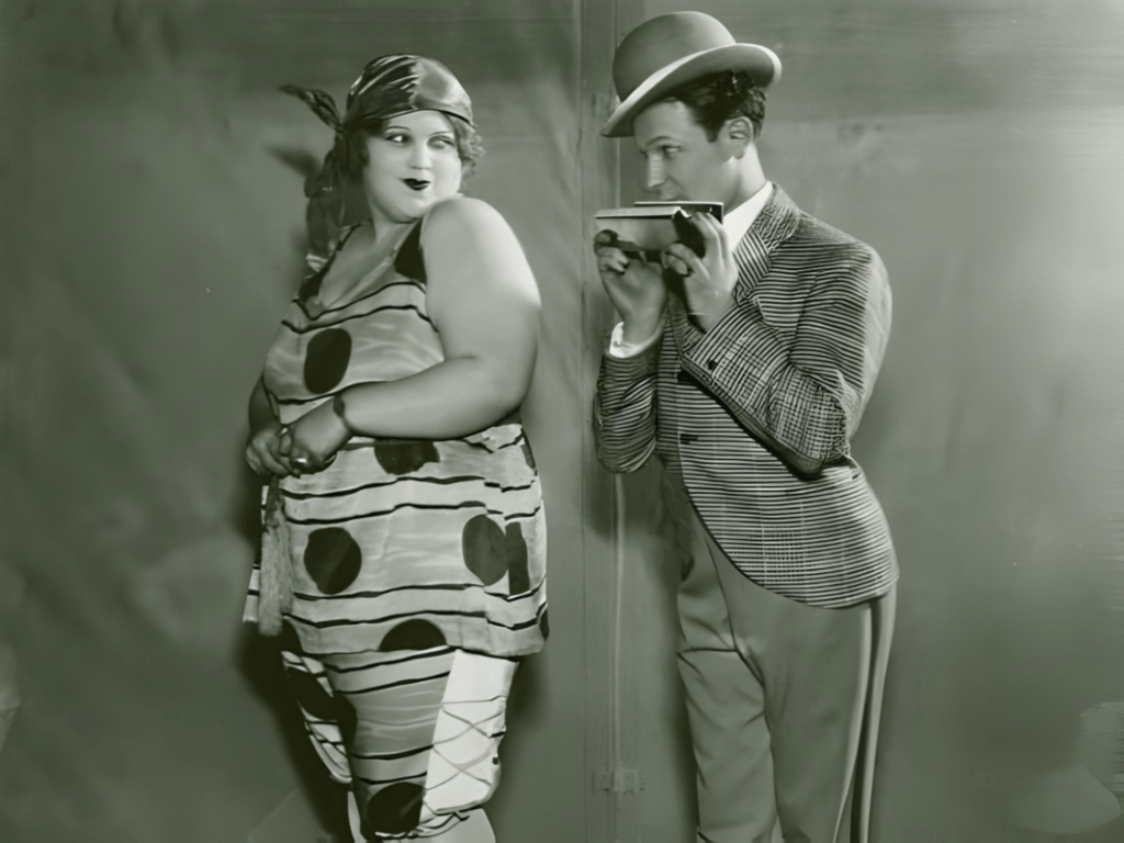 Belle Baker as the title character of BETSY, with Borrah Minevitch