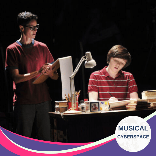Adult Alison (Beth Malone) watches as Medium Alison (Emily Skeggs) sketches at her desk, surrounded by pencils and books in a dimly lit space, evoking the show’s framing device of memory and creation.