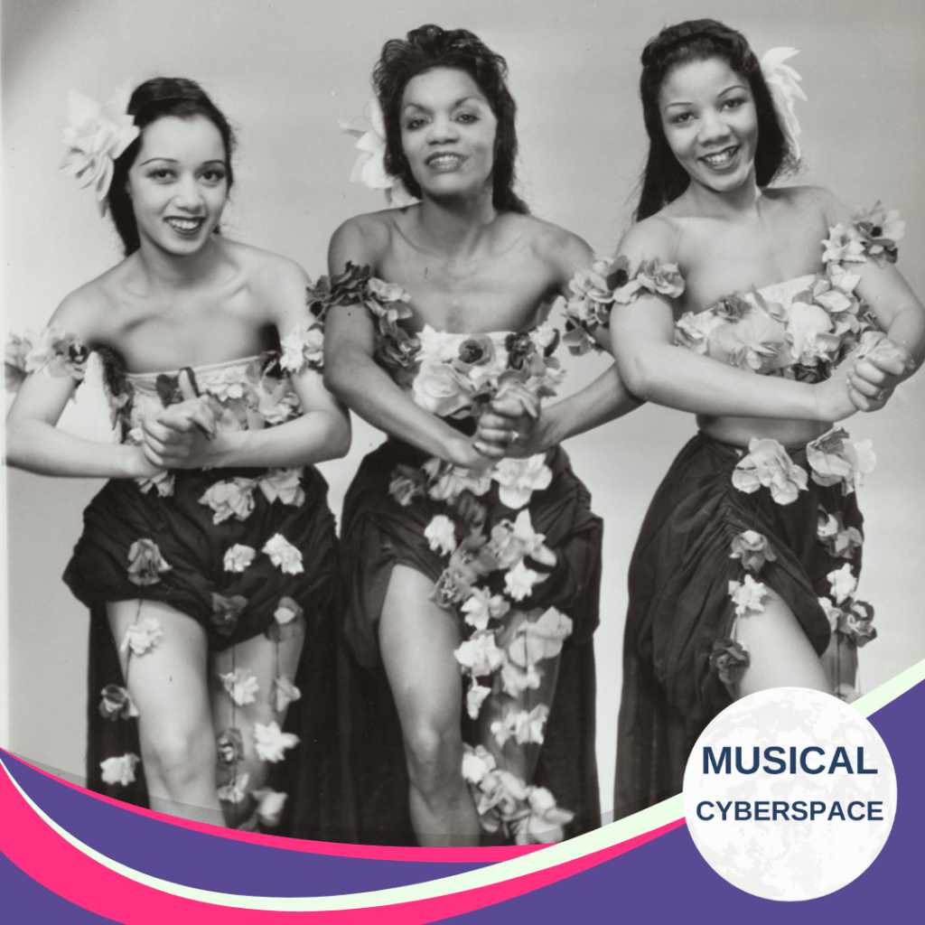 Three cast members from THE SWING MIKADO (1938) strike a dance pose in tropical-style costumes, reflecting the swing and jitterbug-infused reimagining of Gilbert and Sullivan’s operetta.