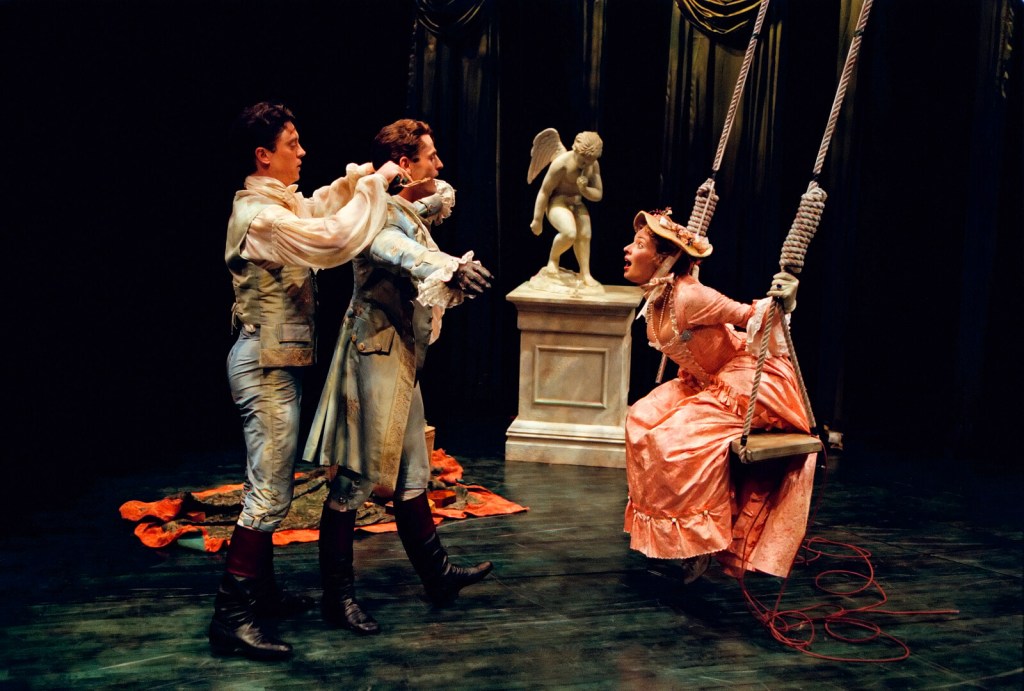 Scott Taylor, Seán Martin Hingston and Stephanie Michels performing an expressive dance sequence in CONTACT, staged against a minimalist set emphasising movement and physical storytelling.